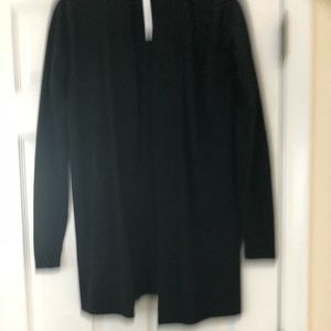 Lululemon sweater silts up the sides. Black